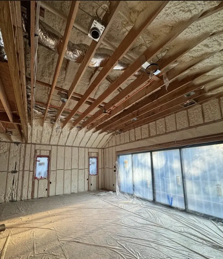 Interior walls and ceiling insulated with spray foam during new construction in North Ogden